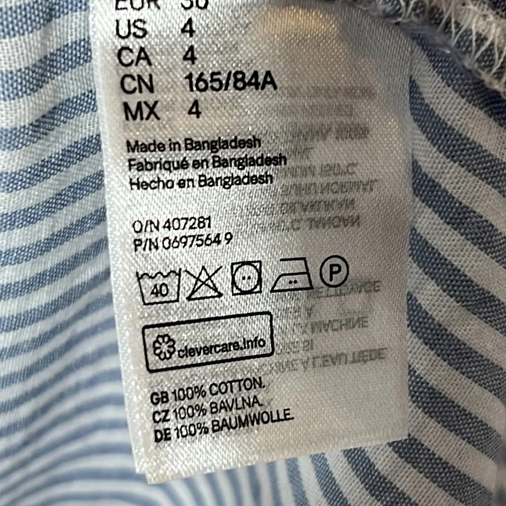 Divided striped lightweight button front top size 4